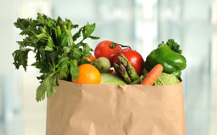 Produce in a paper grocery bag