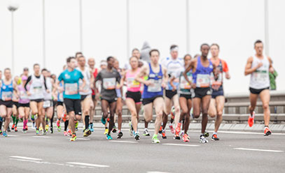 Group of people running a race