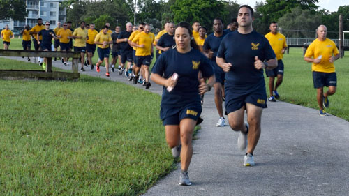 Navy servicemembers running