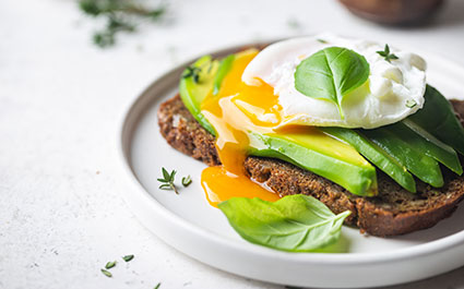Fried egg on top of avocado toast