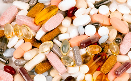 Variety os supplements spread out on a table
