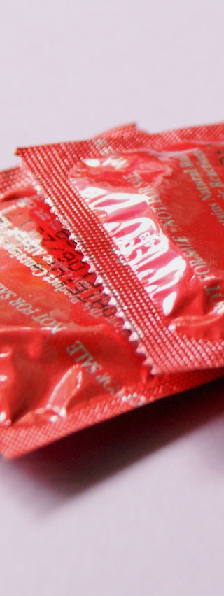 Photo of condoms in red wrappers