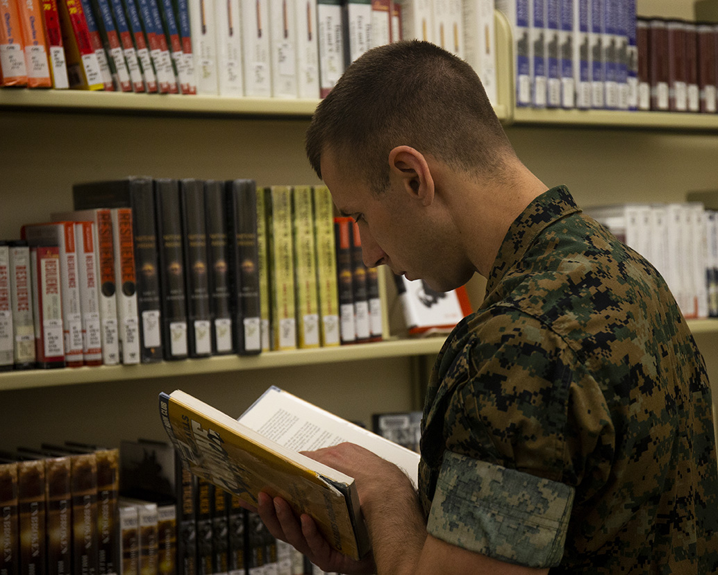 Marine reading a book