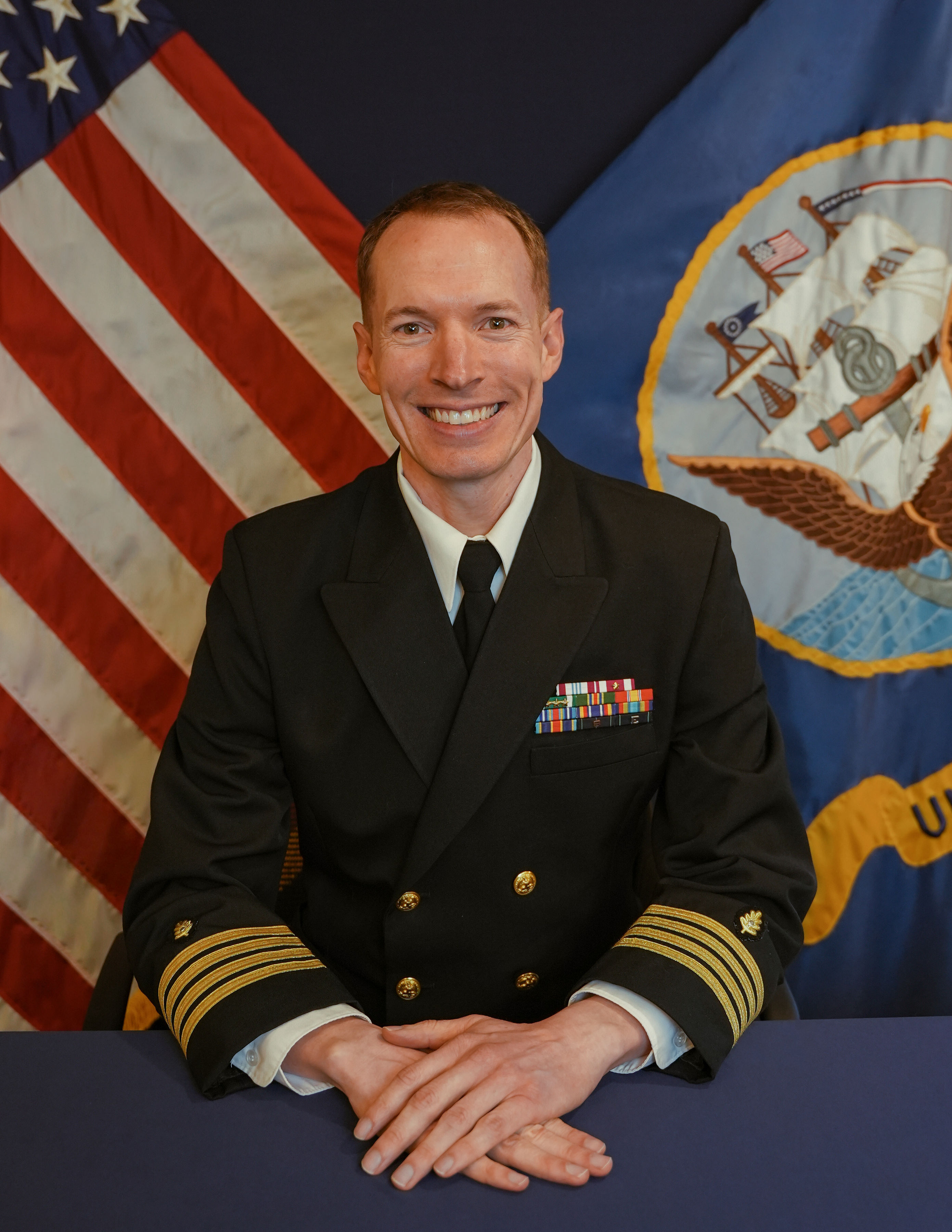 Captain John M. Burger, Executive Officer, NEMWDC